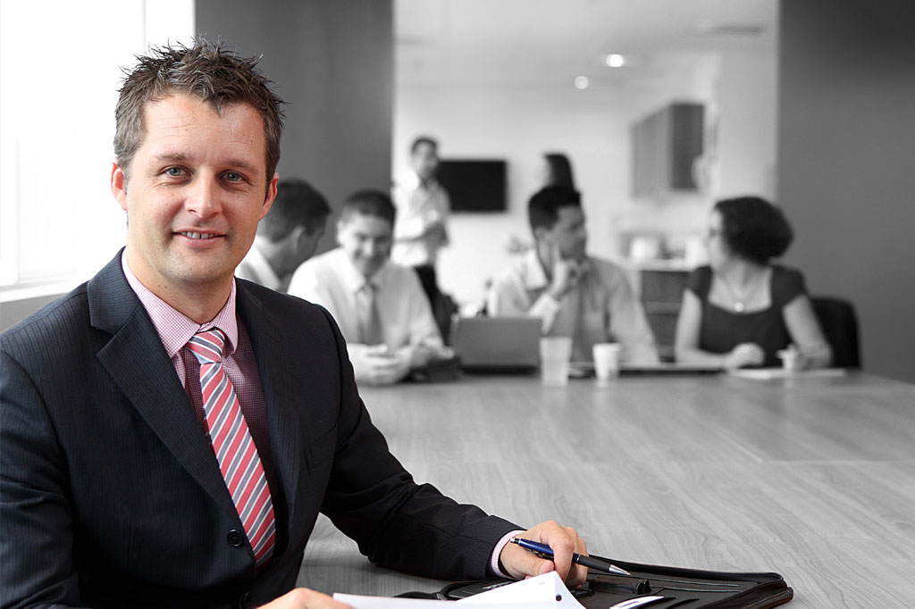 AB Phillips director in boardroom environment reflecting professional corporate photography style and financial services branding Melbourne