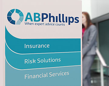 AB Phillips outdoor signage rebranding highlighting Insurance, Risk Solutions and Financial Services
