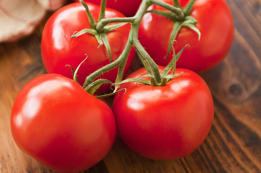 Fresh ripe tomatoes photographed for Spudbar advertising campaign highlighting wholesome ingredients, flavour and healthy food branding Melbourne