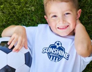Rebranded Sunshine Heights Junior Soccer Club logo emblem that celebrates the club's heritage while creating a distinctive sports brand identity by Melbourne freelance branding consultant.