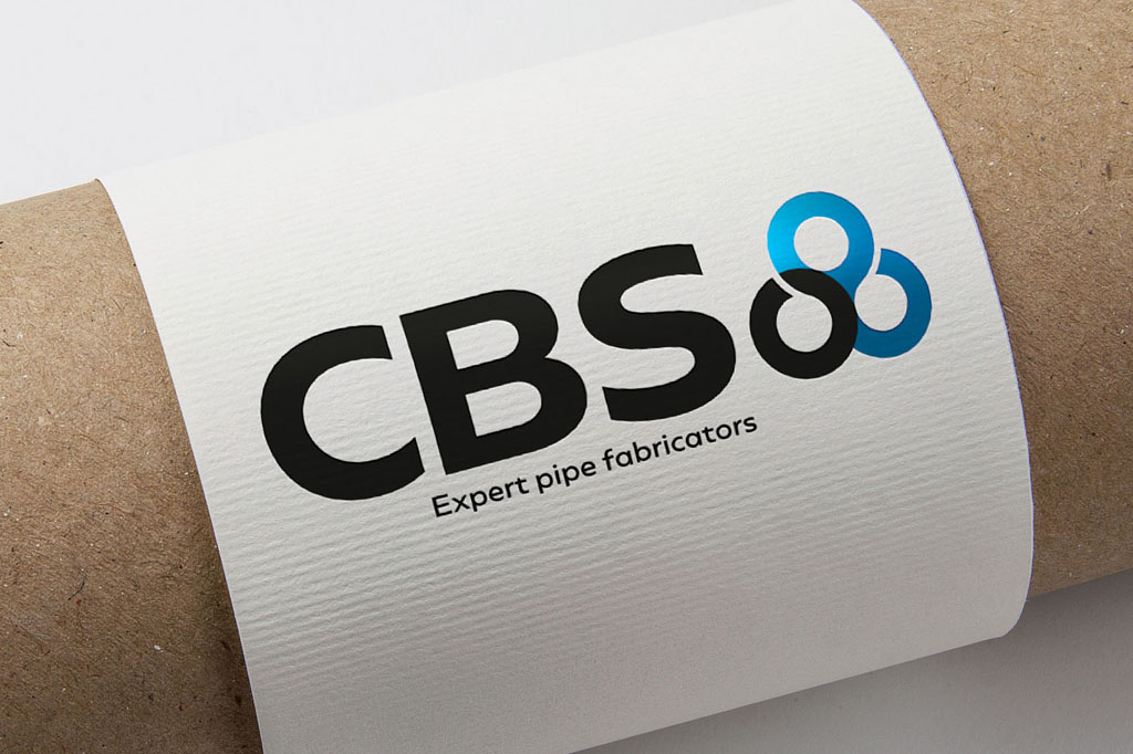 CBS branded cylinder mailing tube showcasing professional brand identity and logo design for an industrial pipe fabrication company, created by Melbourne freelance branding consultant.