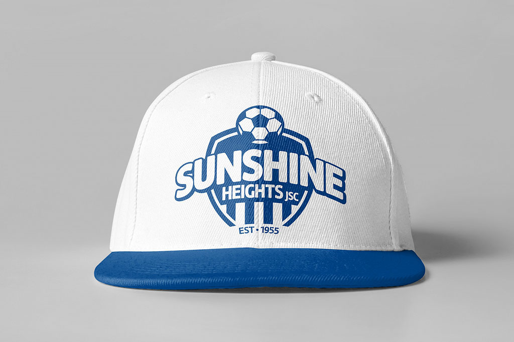 Sunshine Heights Junior Soccer Club branded cap featuring the new club logo, reinforcing a consistent sports brand identity across merchandise and apparel.
