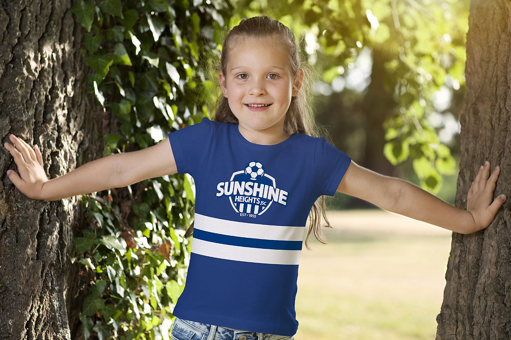 Young Sunshine Heights Junior Soccer Club member wearing a branded club T-shirt, reflecting community pride, youth participation and memorable sports branding by Melbourne freelance branding consultant.